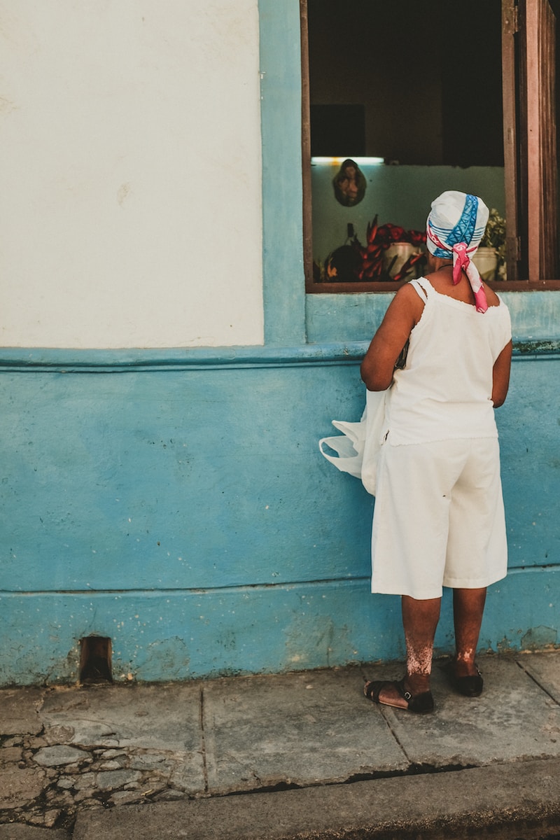 A woman looking in from the outside