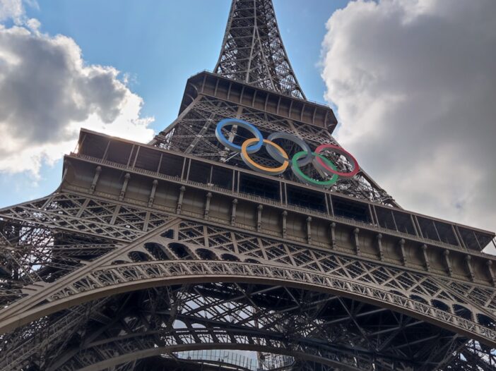 The eiffel tower with the olympic logo on it. Pride, the Olympics, and Being Sad all at one opening event.